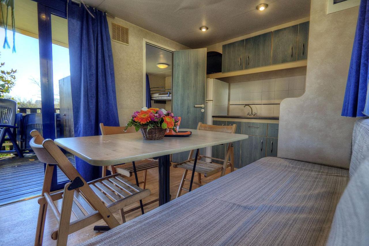 Budget Two-Bedroom Bungalow Kitchenette Patio
